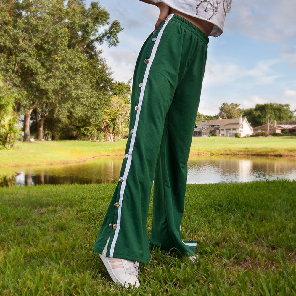 Green button breakaway track pants